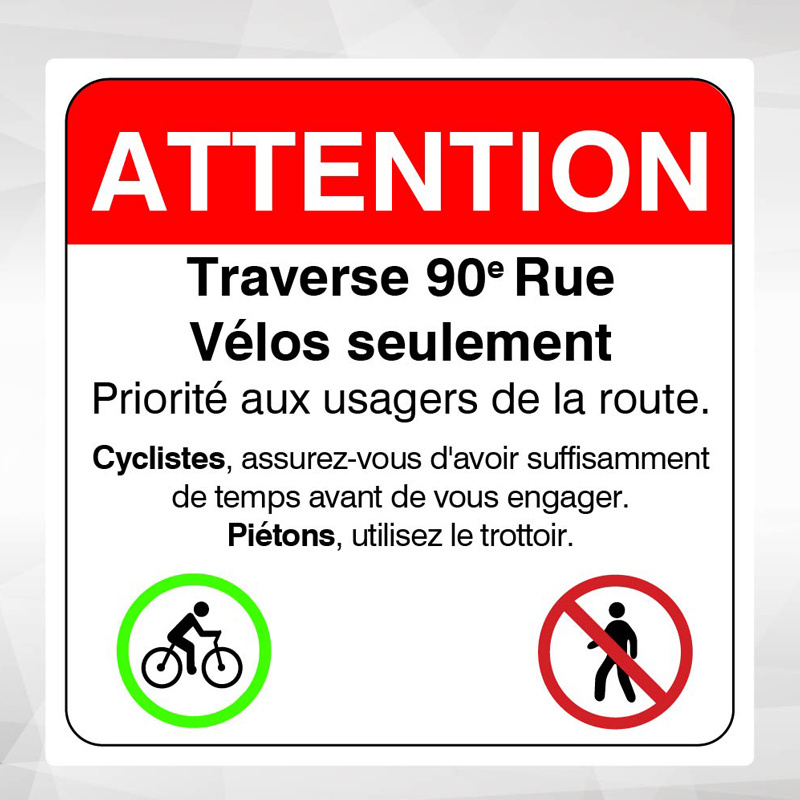 Travaux d'aménagement d'une traverse pour les cyclistes sur la 90e Rue